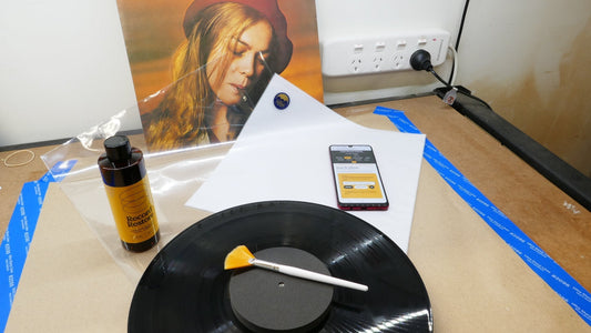 Vinyl record care setup with Record Restore treatment and archival sleeves