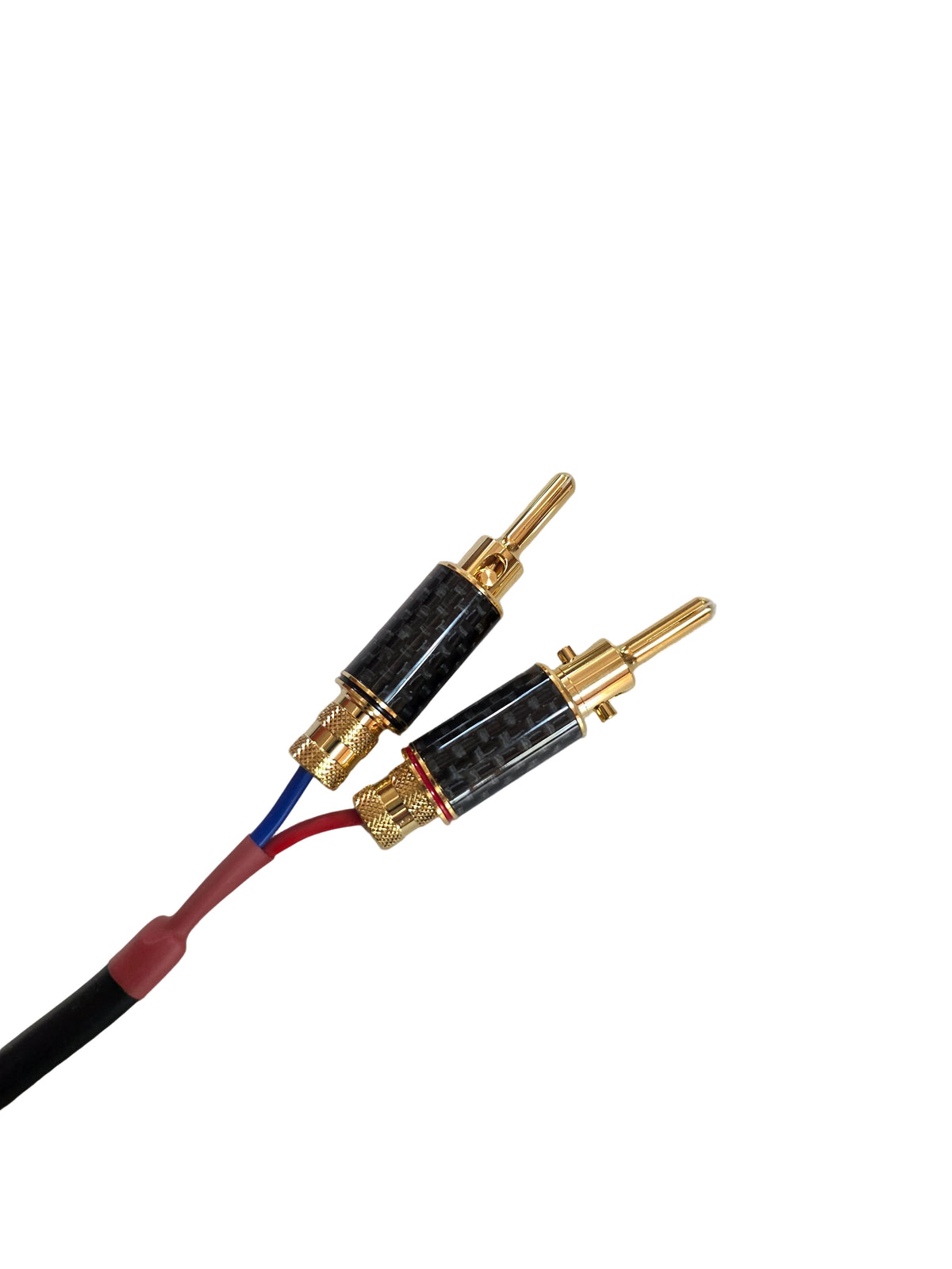 Speaker cable with gold plated expanding banana plug connectors in carbon fibre shell